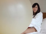 Japanese Girl Inside A Giant Balloon